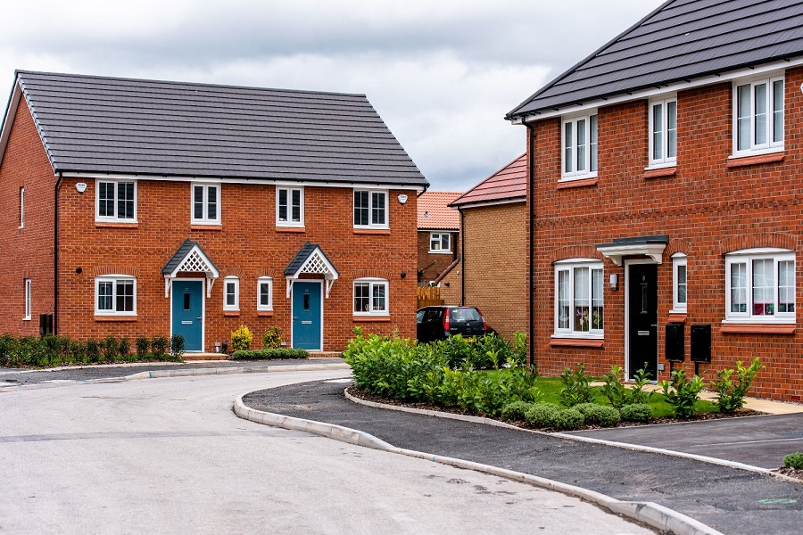 Street scene of family houses in Our Ladys, Worsley