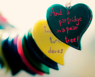 heart decoration with 'and a partridge in a pear tree' engraved on it.