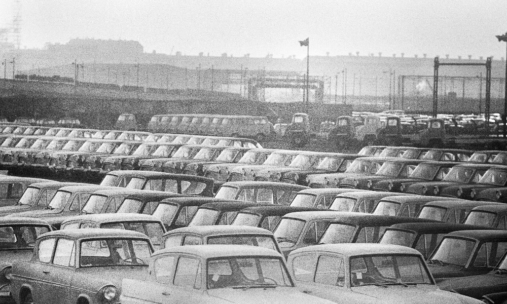 Black and white photograph of parked cars