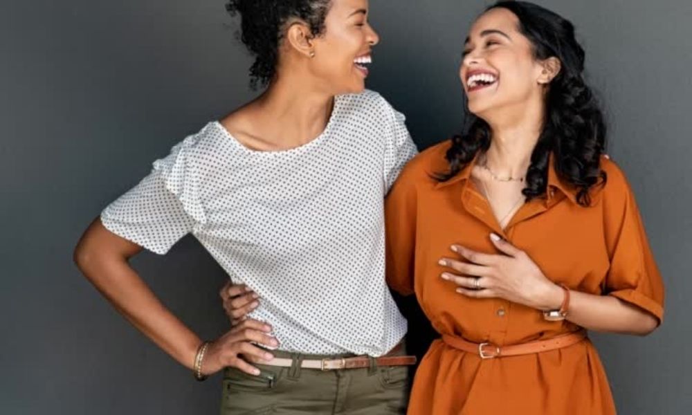 2 women talking happily