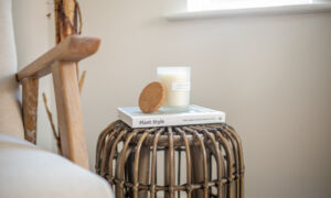 Side table with a book and candle 