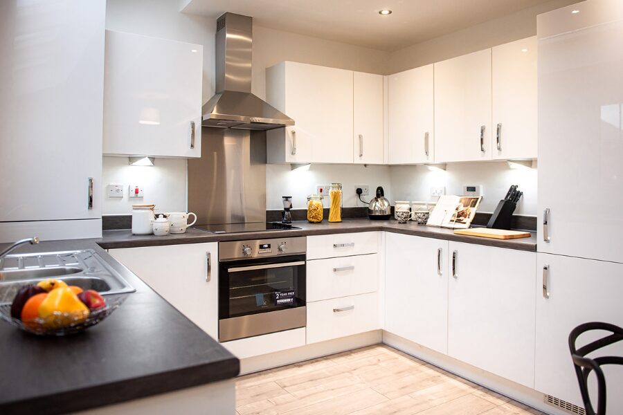 fitted white decorated kitchen