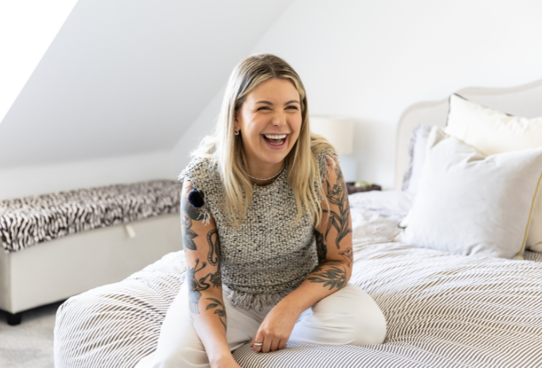 Resident sitting on bed simple Life