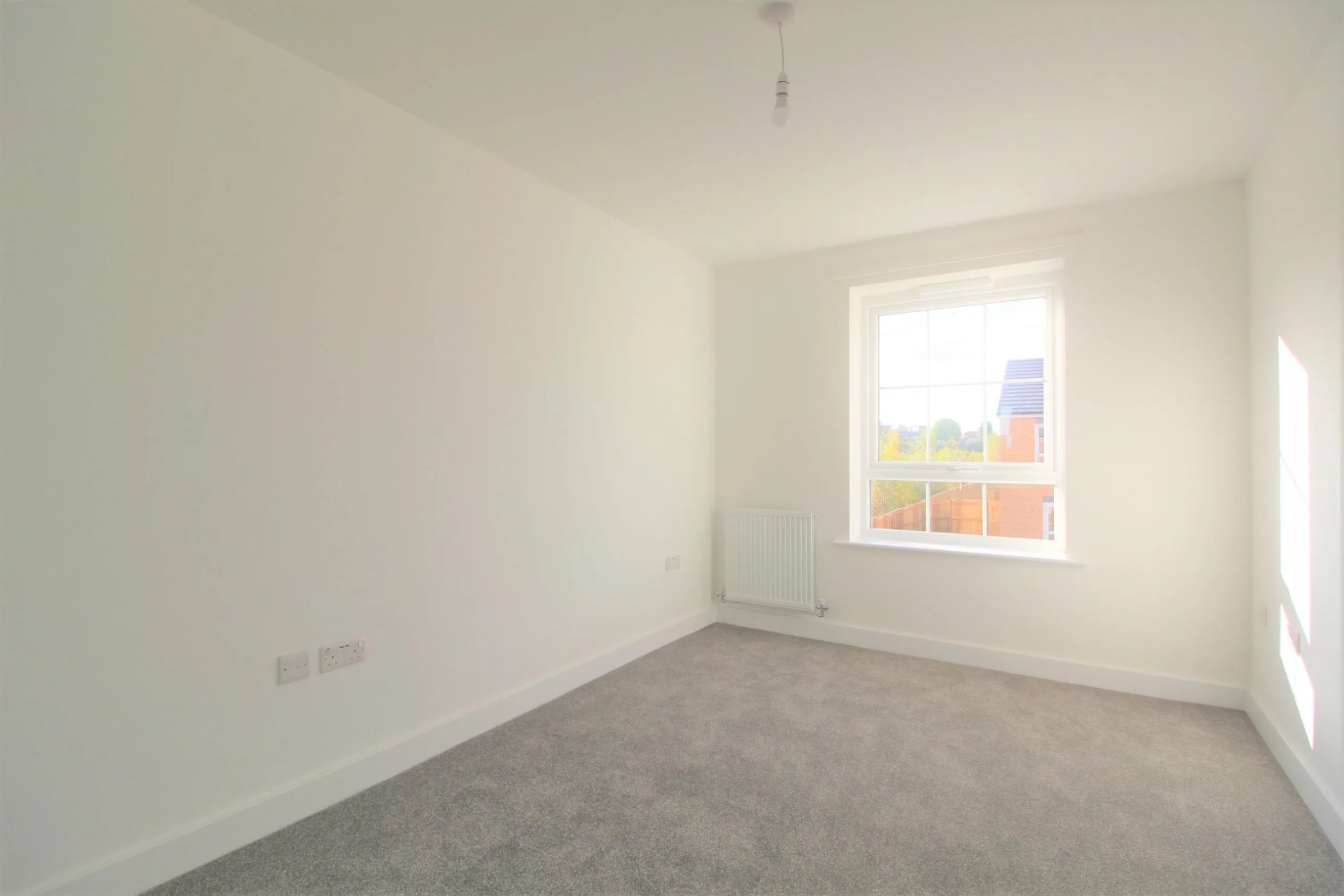 ouse carpeted bedroom 2
