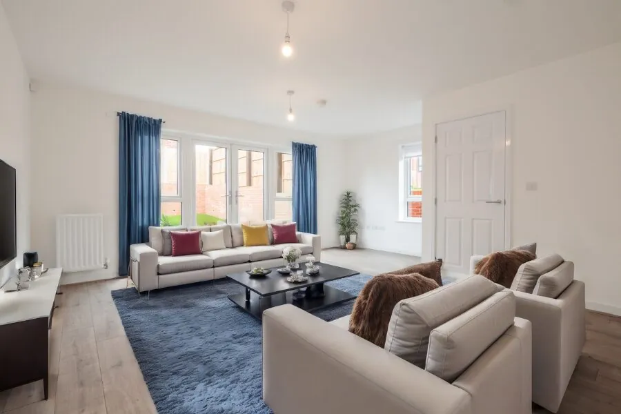 decorated living area and glass back doors