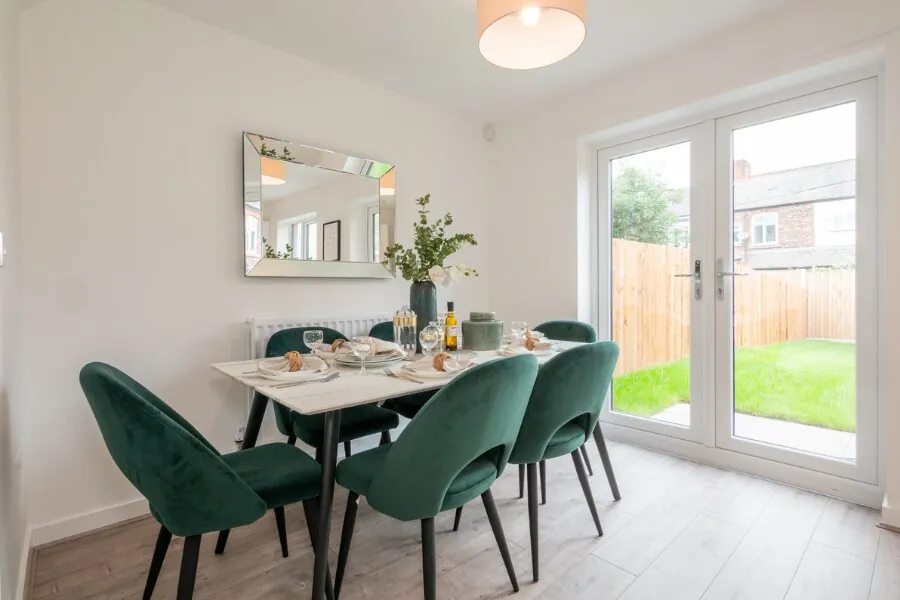 dining area and glass back doors