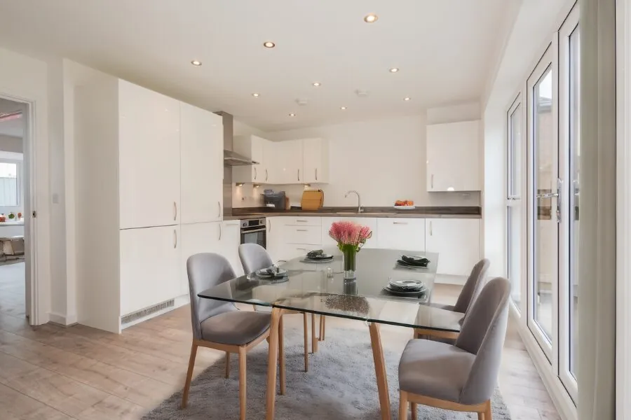 maree white fitted kitchen and dining area
