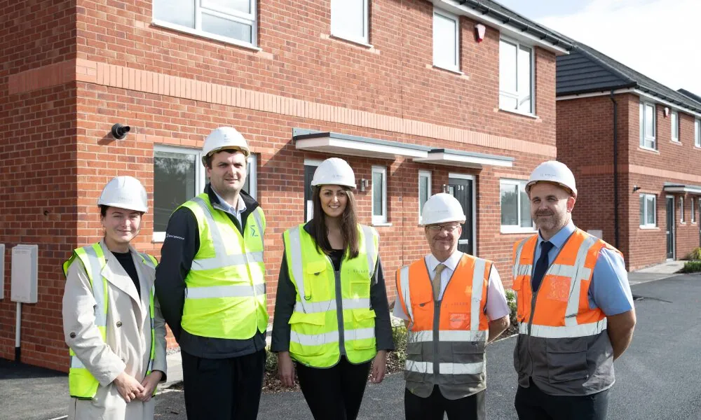 Kellen Hands Over First Dozen Homes to Sigma