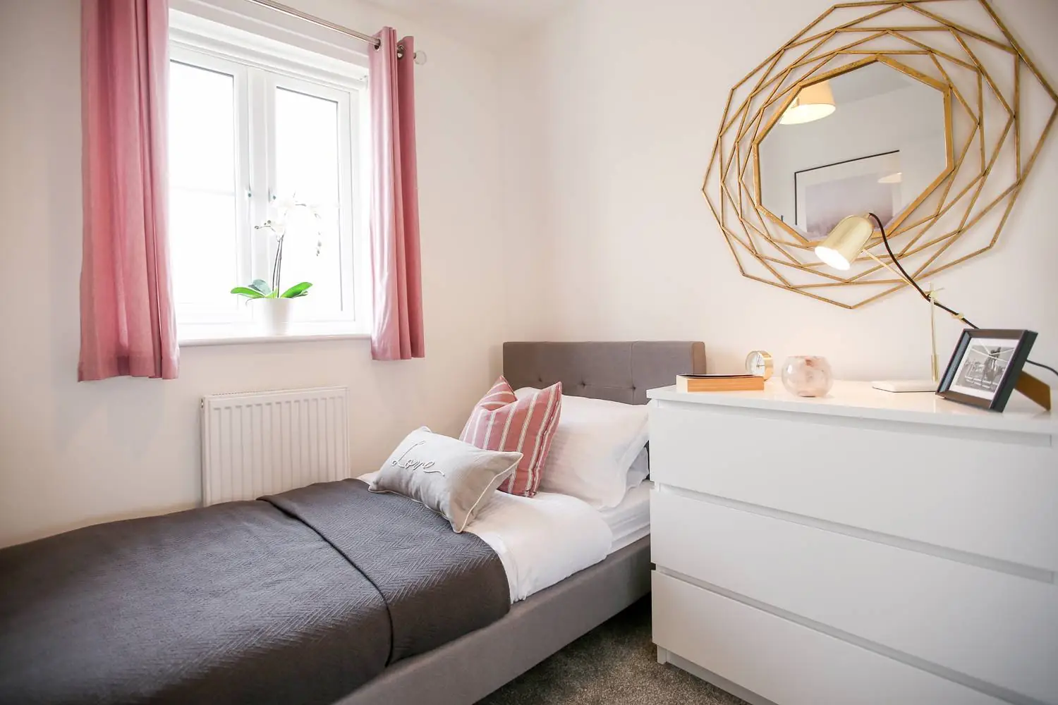 small carpeted bedroom